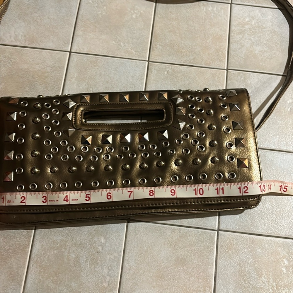 Bronze studded clutch
